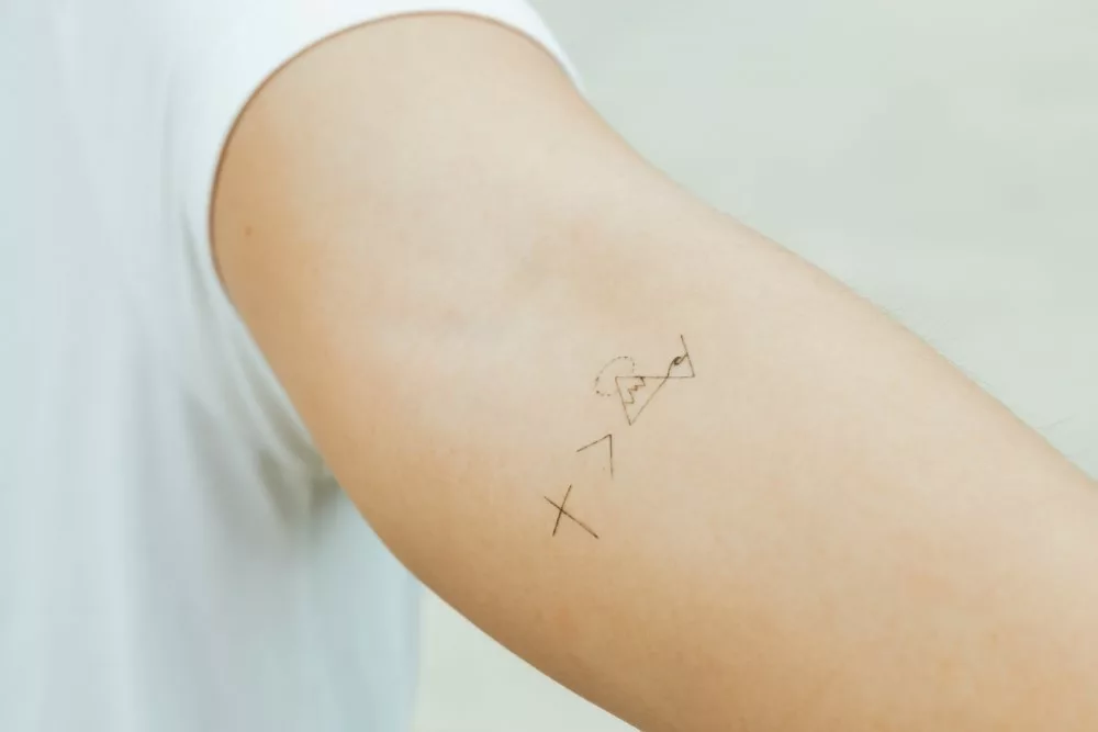 does laser hair removal affect tattoos